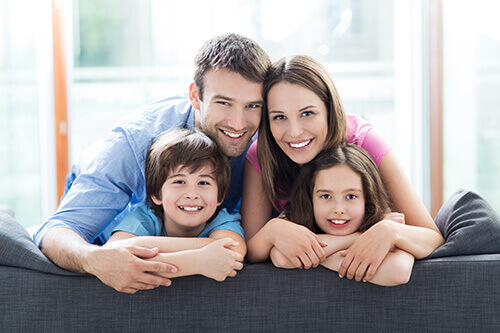 Happy Family on a Couch